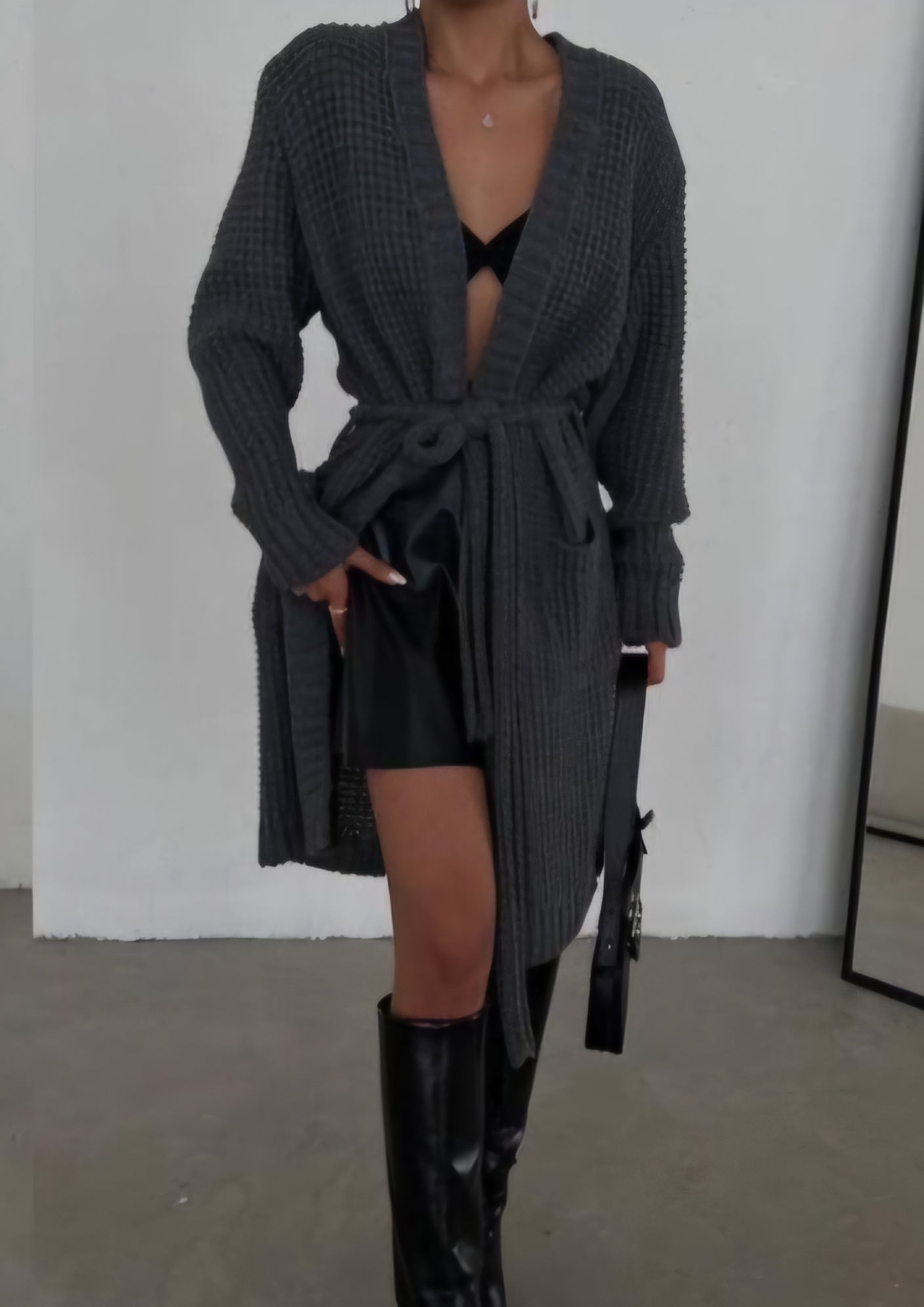 Knitted cardigan with a belt